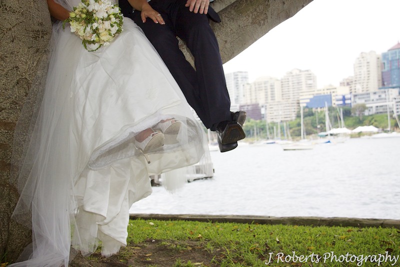 Couples feet swinging in a tree - wedding photography sydney